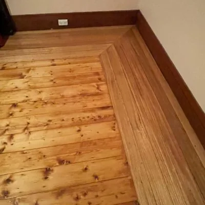 Warm timber lined ceiling in a finished room