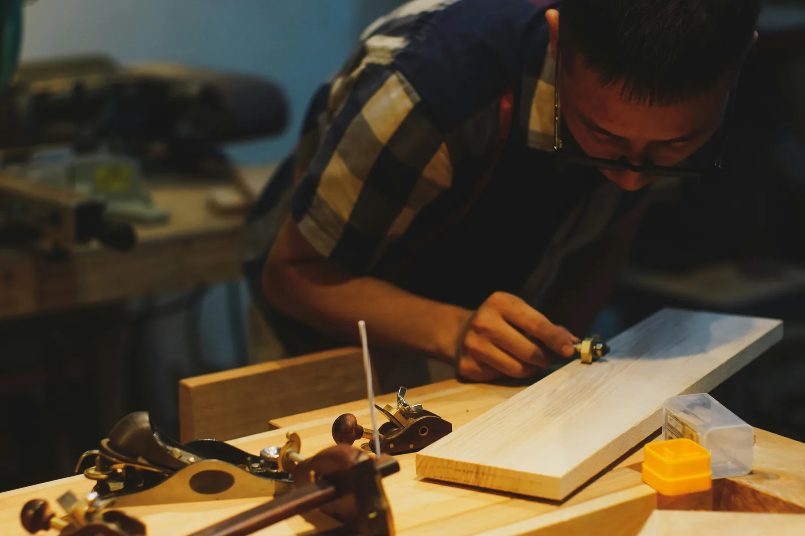 Hand plane and timber on a workbench